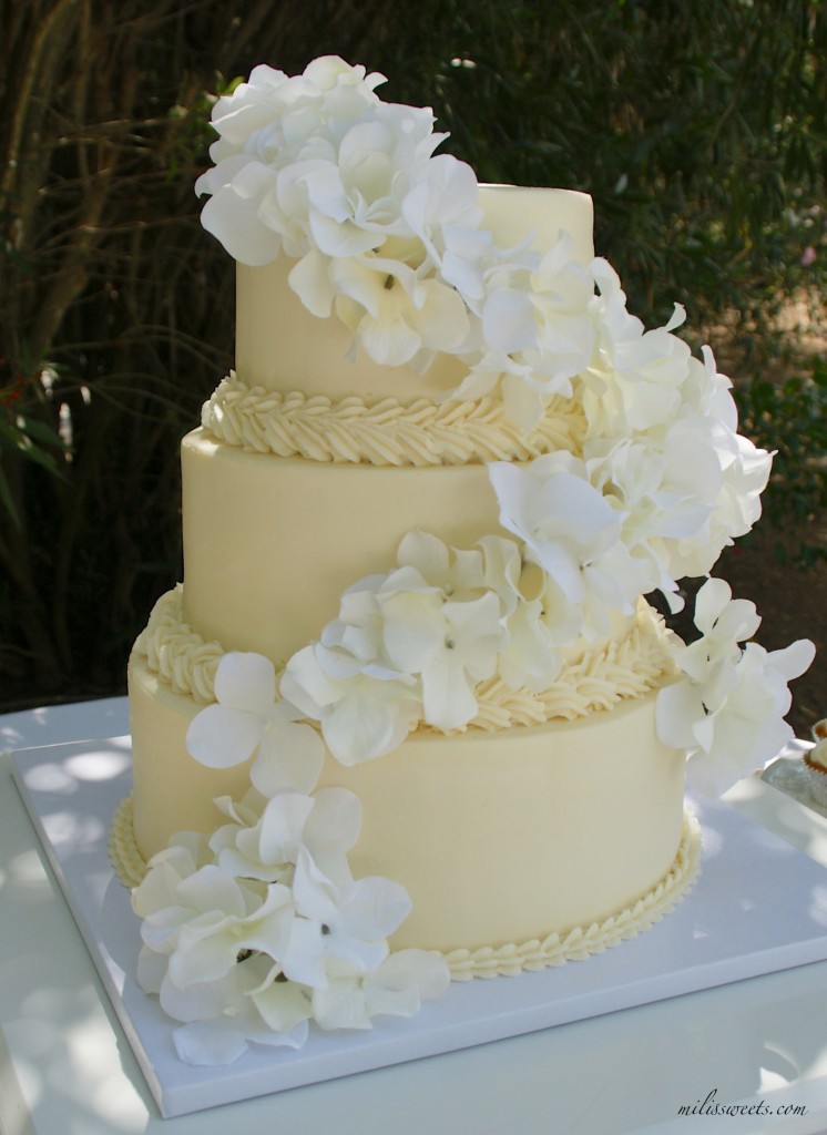 citrus orchard reception and hydrangea wedding cake, via milissweets.com