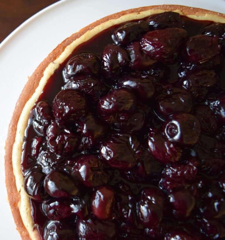 cherries on classic vanilla bean cheesecake